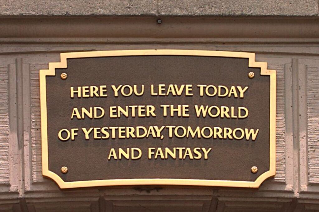 A photo of a sign at the entrance of Main Street USA in Disneyland.